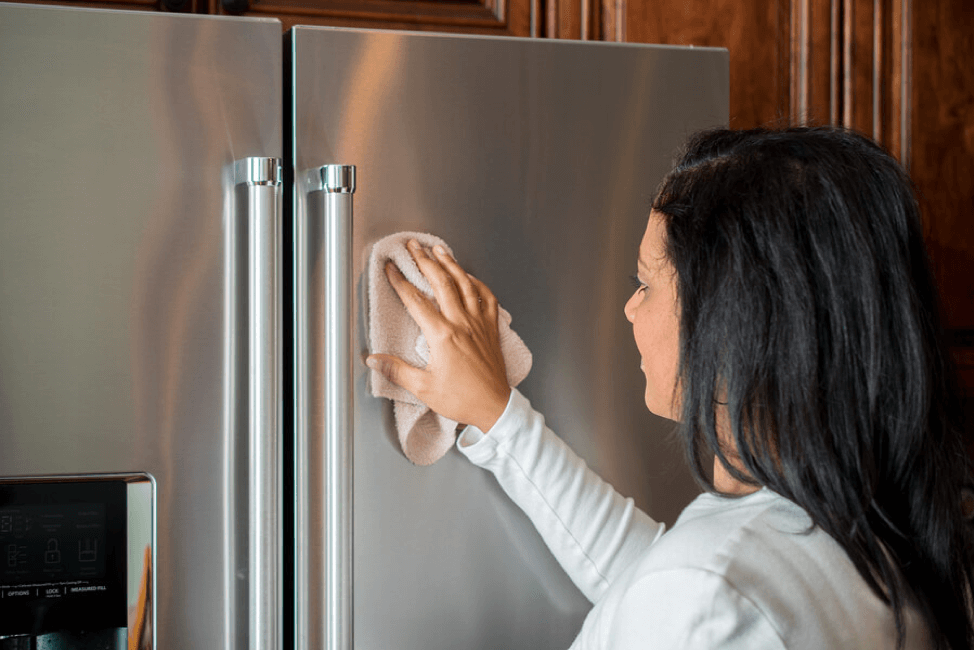 woman-cleaning-refrigerator