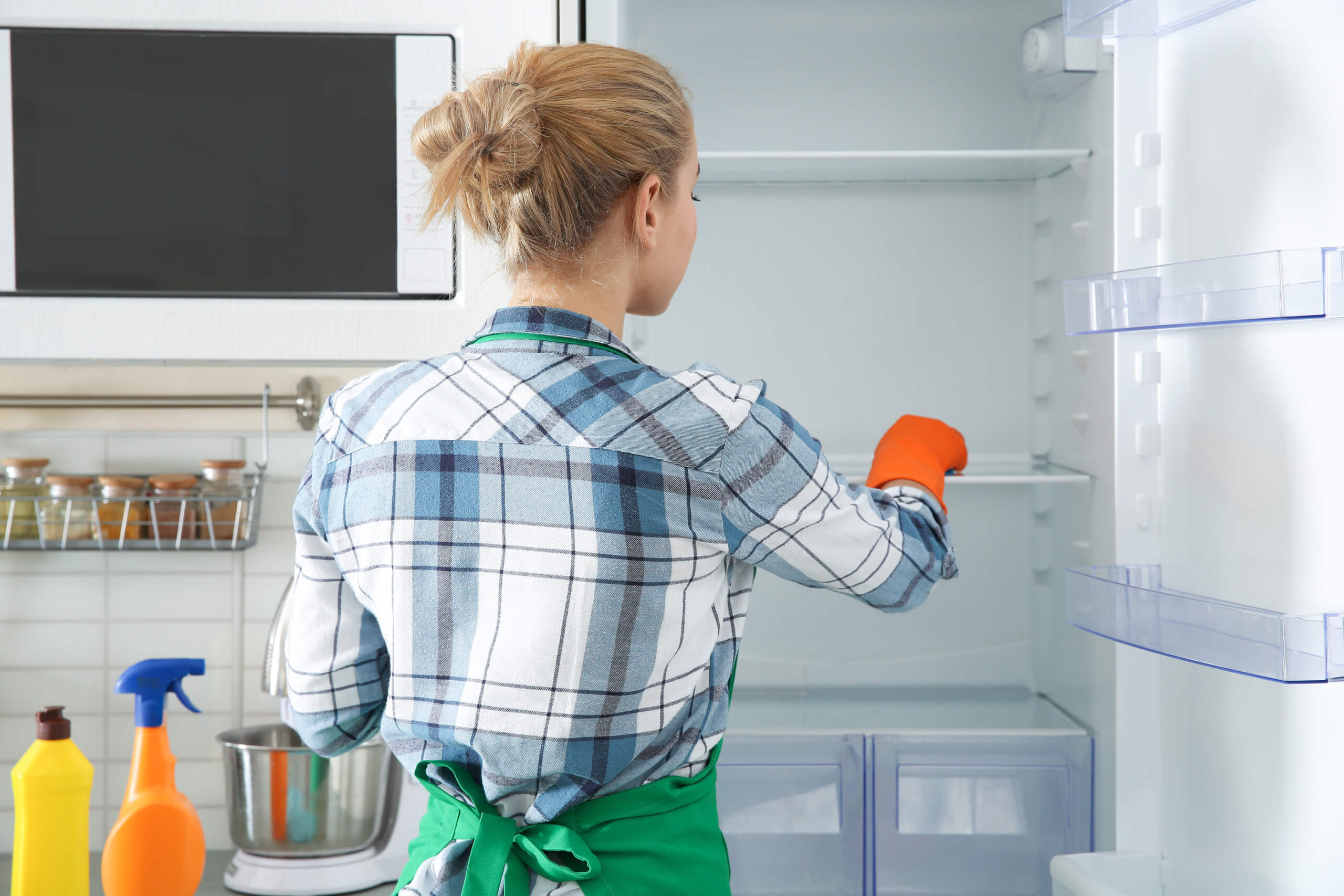 Woman-Gloves-Cleaning-Refrigerator