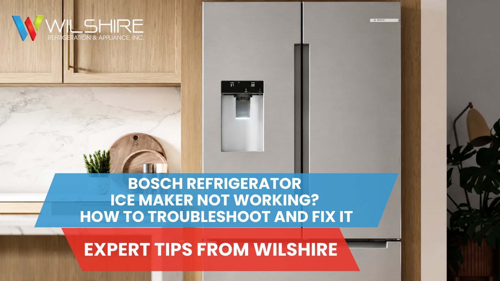 Modern stainless steel Bosch refrigerator with a top ice maker, standing beside light wood kitchen cabinets and a marble countertop with a small potted plant and cutting board.