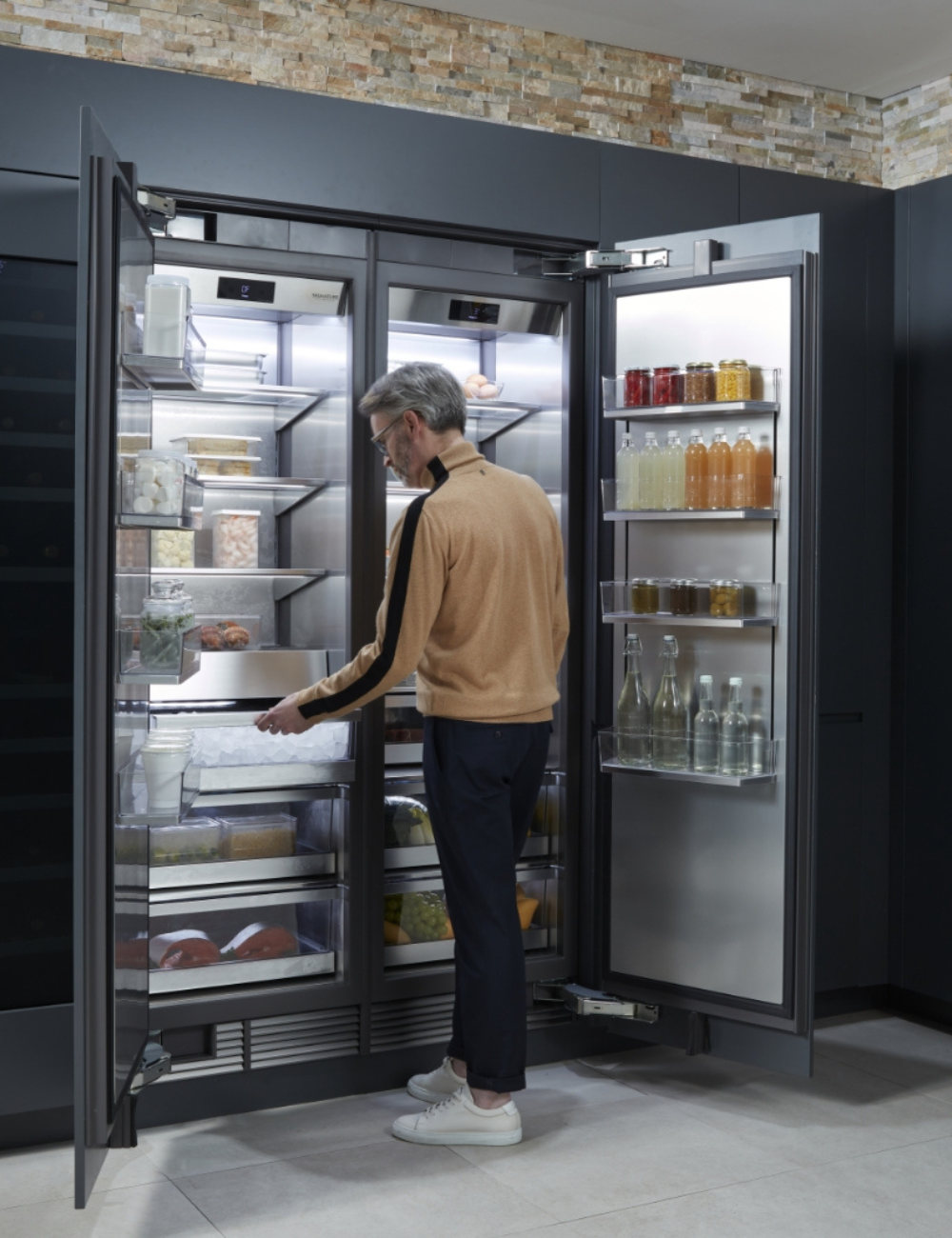 Man opening fridge