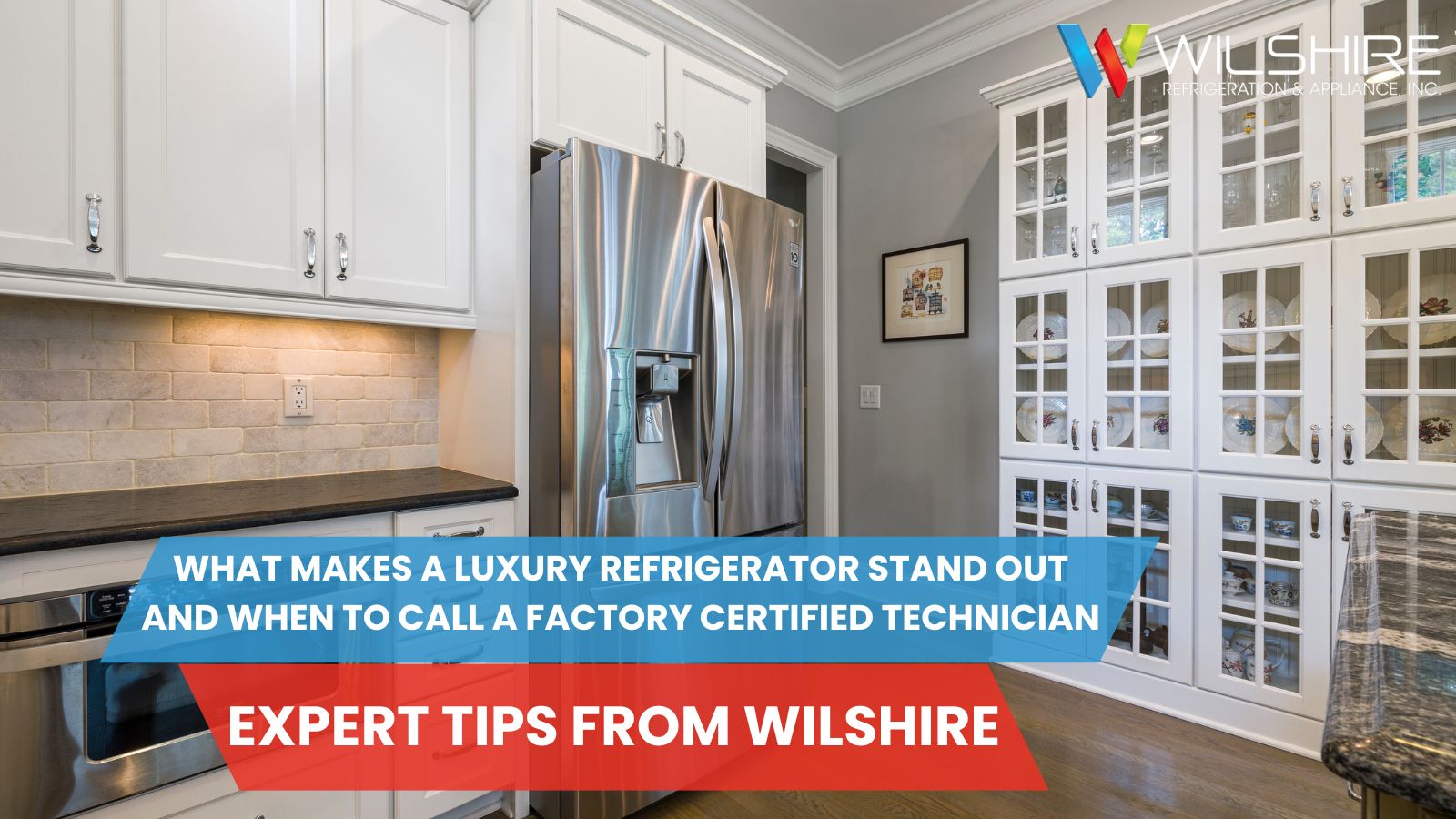 A promotional image featuring a bright kitchen with white cabinetry and a large stainless steel French-door refrigerator in the center. To the right, a floor-to-ceiling cabinet with glass doors displays dishware. A blue and red text overlay at the bottom reads: "WHAT MAKES A LUXURY REFRIGERATOR STAND OUT AND WHEN TO CALL A FACTORY CERTIFIED TECHNICIAN - EXPERT TIPS FROM WILSHIRE." The Wilshire Refrigeration logo is located in the top right corner.