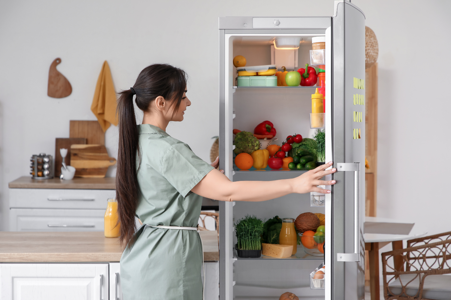 Homeowner checking refrigerator
