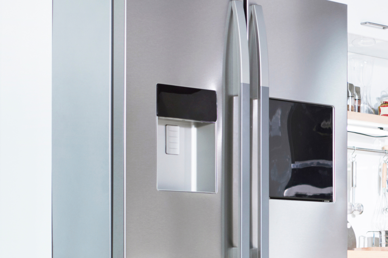 Stainless steel refrigerator with water dispenser showing where fridge water is filtered