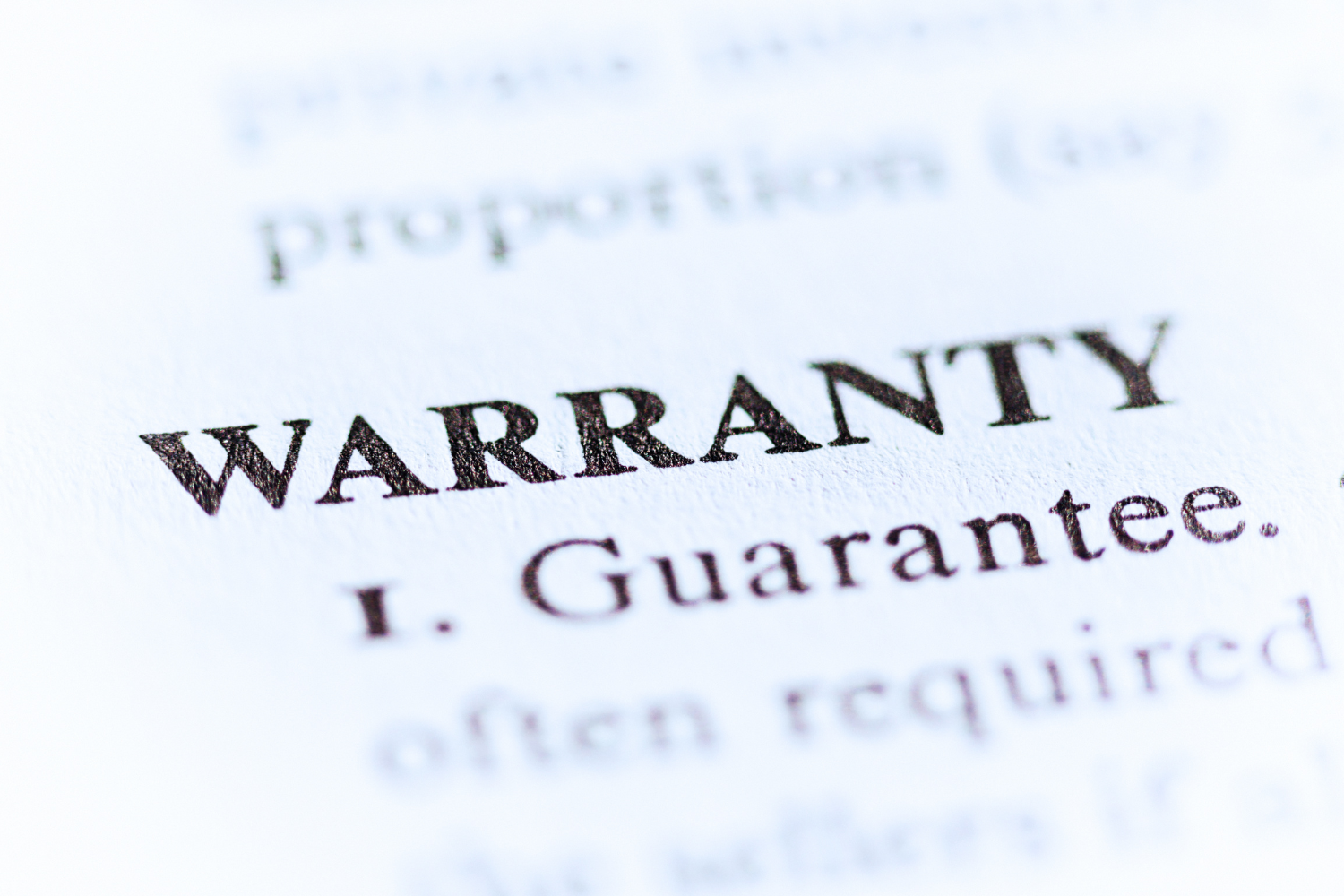 Close-up of warranty document for Sub Zero fridge repair coverage guide