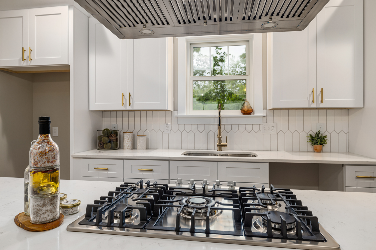 Premium gas cooktop in a luxury kitchen for stove repair and range repair decision guidance