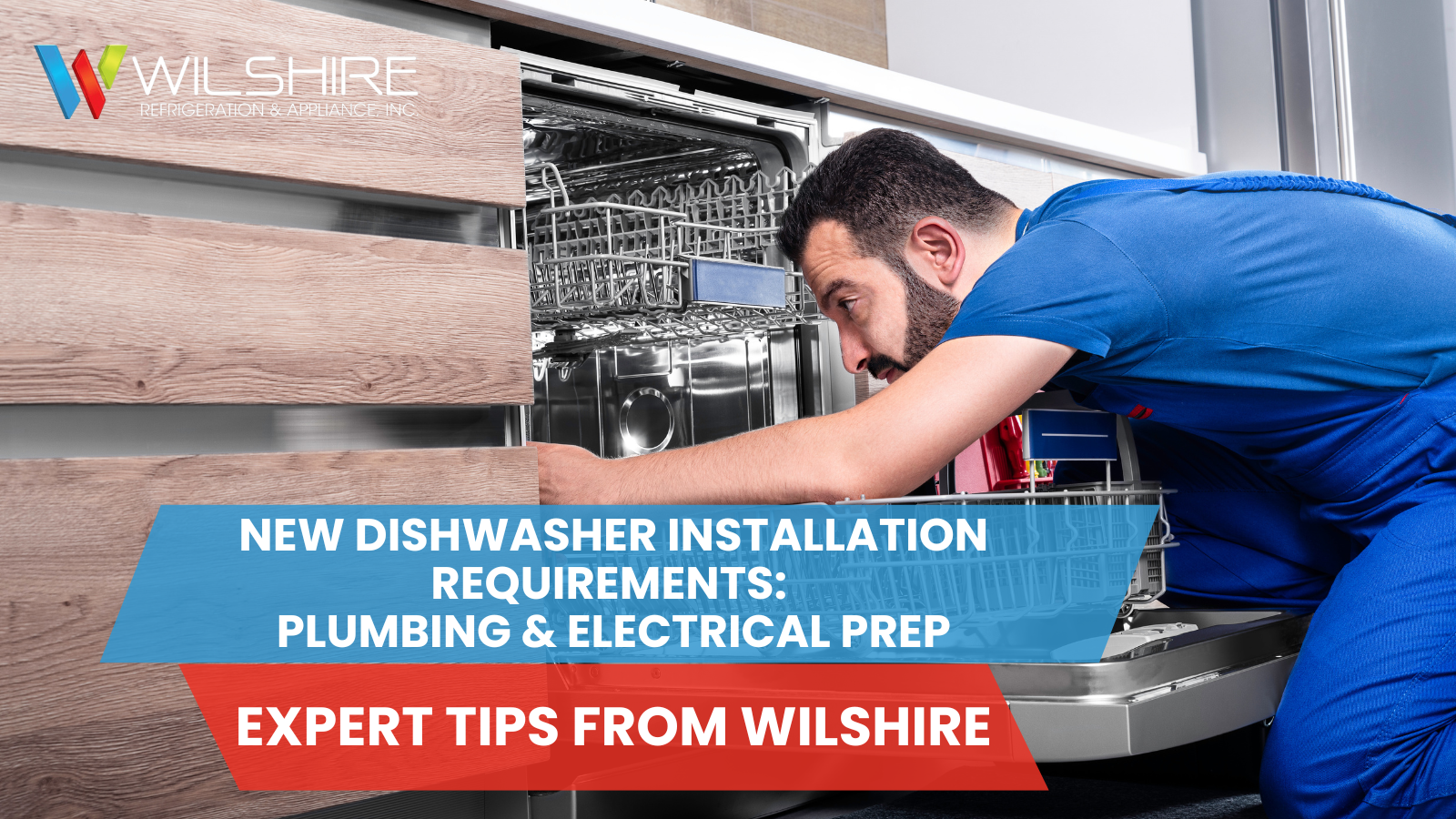 A person in a blue uniform is repairing an open dishwasher with racks inside.