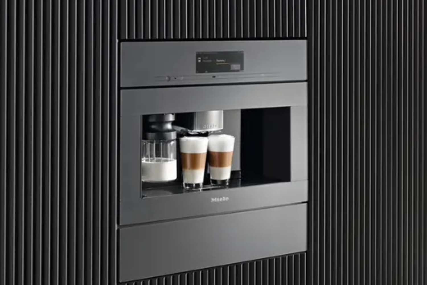 Built-in Miele coffee machine in a luxury kitchen for high-end appliance repair and service.