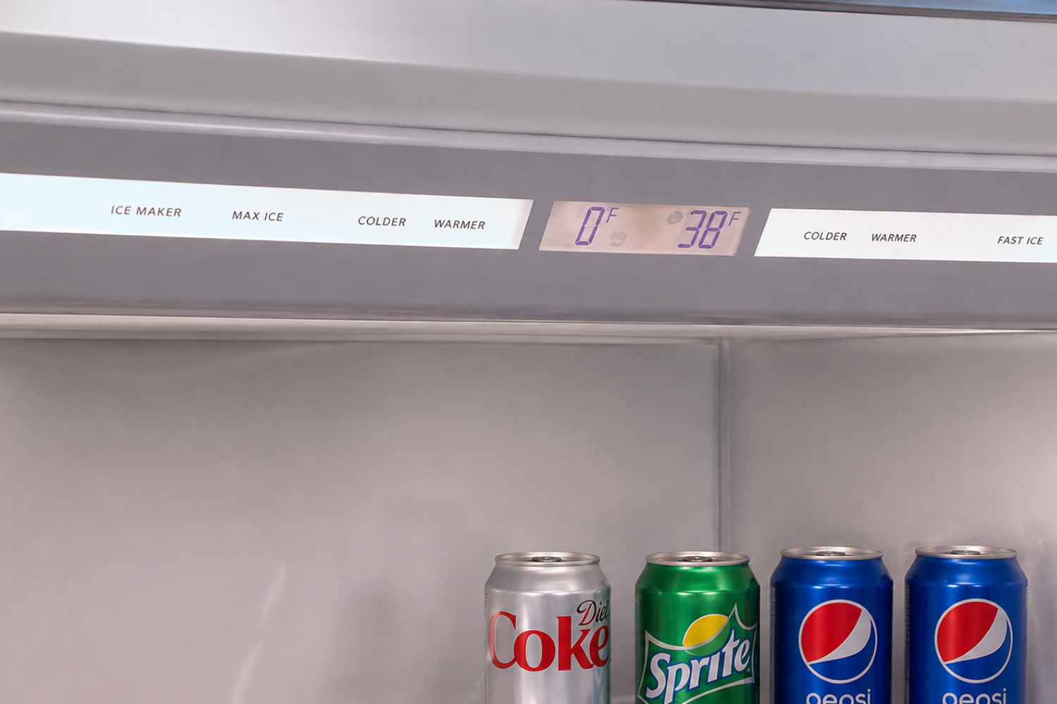 Sub-Zero refrigerator interior showing a 38°F temperature setting with chilled beverage cans stored below.