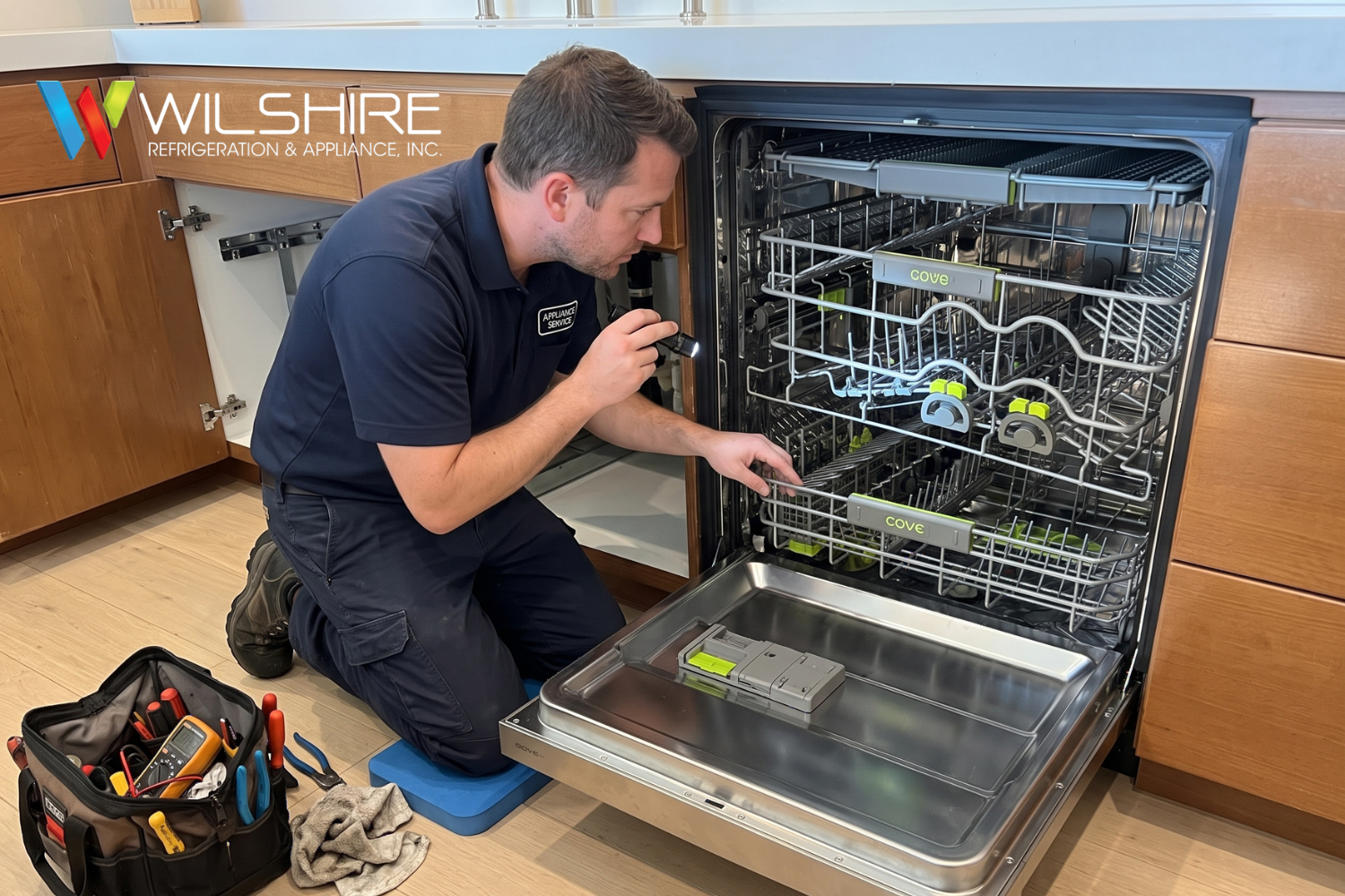 Technician inspecting Cove dishwasher interior