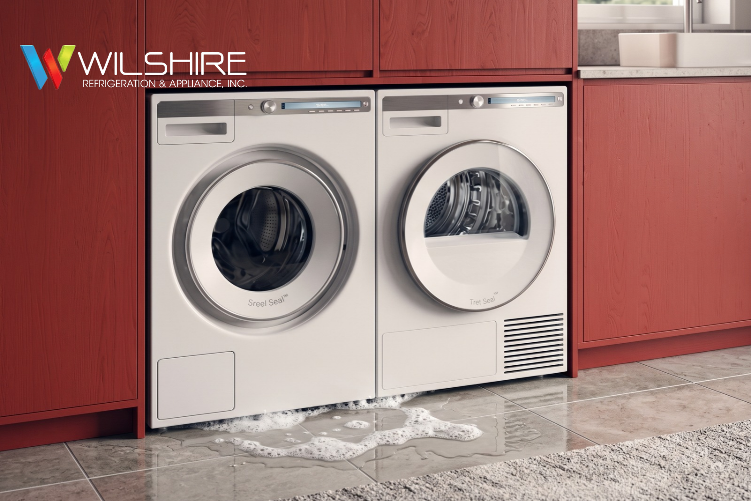 Front‑loading ASKO washer leaking water onto tiled floor